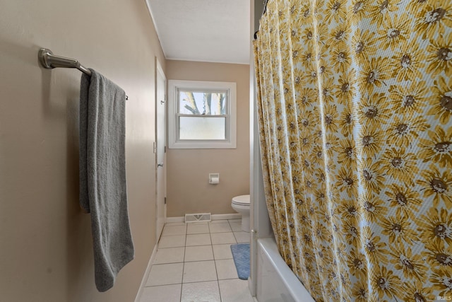 bathroom with tile patterned floors, visible vents, toilet, and baseboards