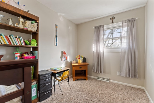 home office with visible vents, baseboards, and carpet