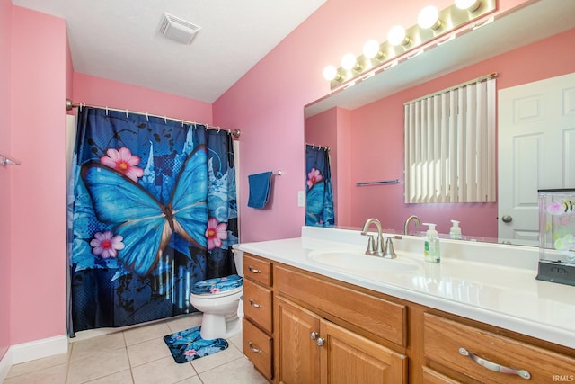 full bath featuring visible vents, toilet, vanity, and tile patterned flooring