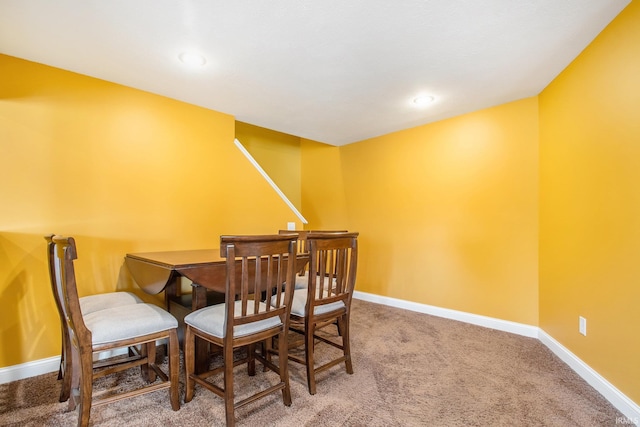 dining room featuring recessed lighting, baseboards, and carpet floors