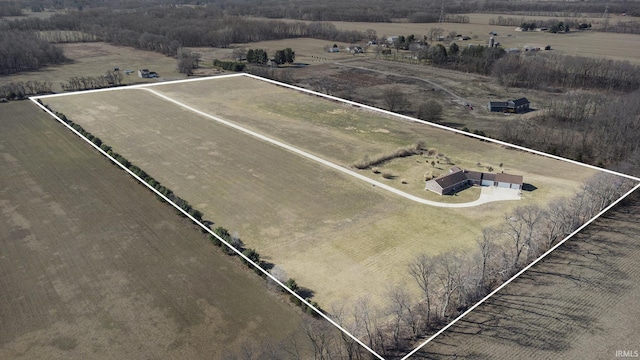 birds eye view of property featuring a rural view