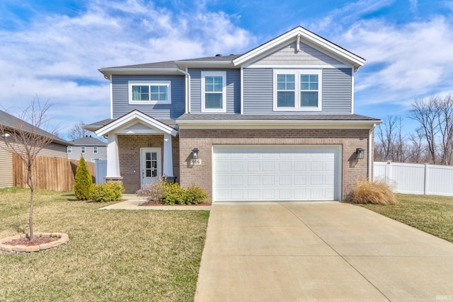 craftsman-style house featuring a front yard, an attached garage, fence, and brick siding