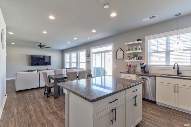 kitchen with visible vents, a sink, dark wood finished floors, recessed lighting, and dishwasher