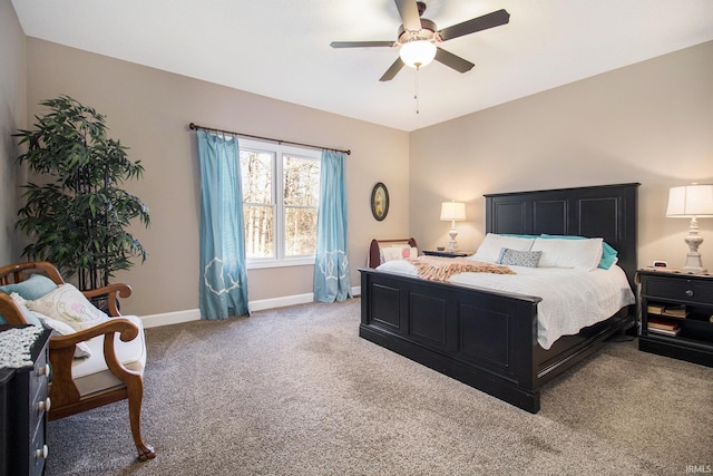 bedroom with ceiling fan, carpet, and baseboards