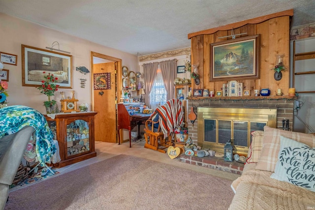 carpeted living room with a brick fireplace and a textured ceiling