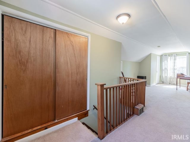 bonus room with carpet flooring and lofted ceiling