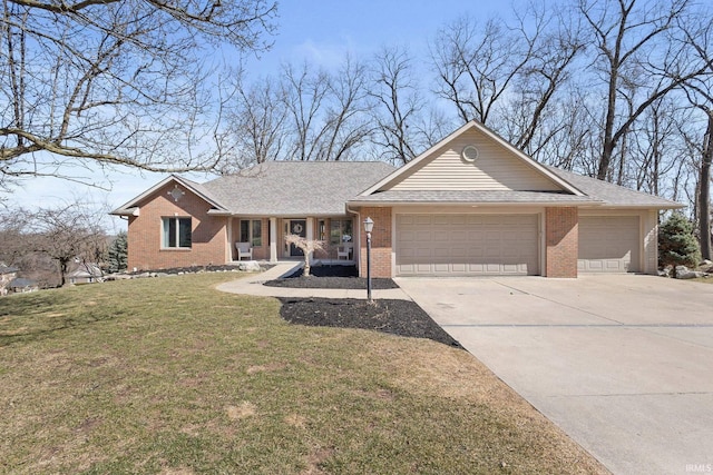 ranch-style house with brick siding, a garage, concrete driveway, and a front lawn