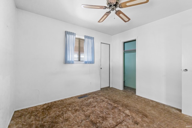 unfurnished bedroom with visible vents and a ceiling fan