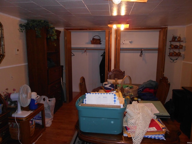 bedroom featuring a closet and wood finished floors