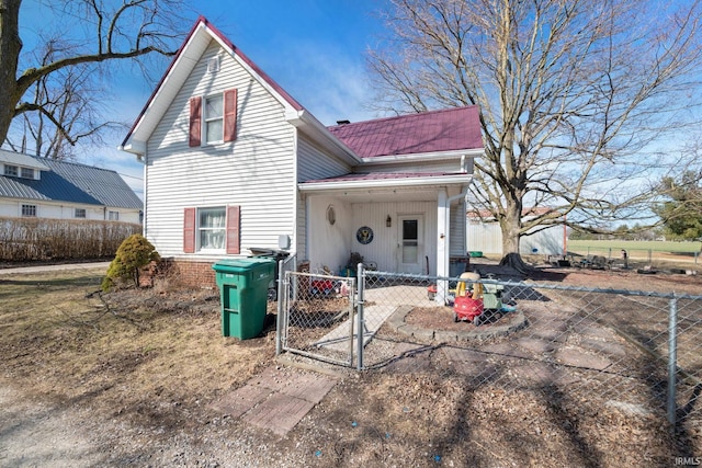 exterior space with a gate and fence