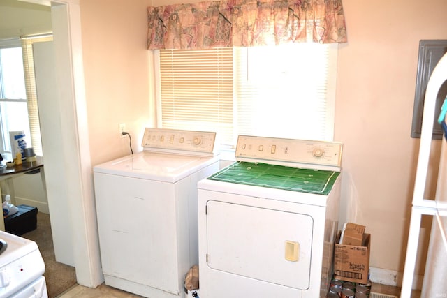 laundry room with washer and dryer and laundry area