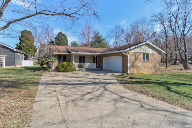 ranch-style house featuring driveway, an attached garage, covered porch, a front lawn, and brick siding