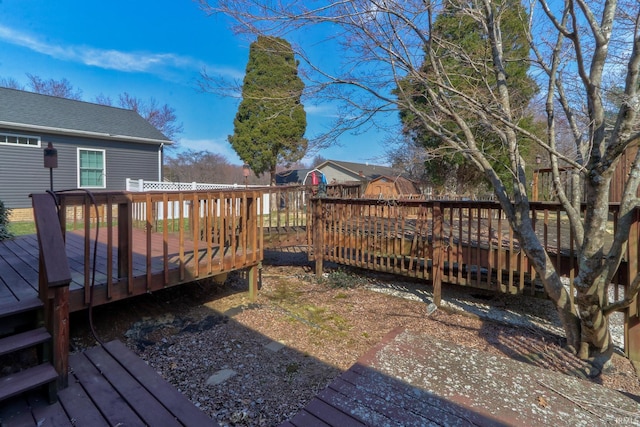 view of yard with a wooden deck