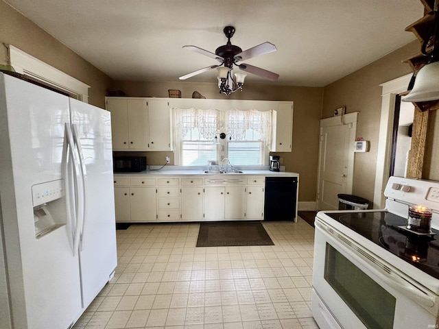 kitchen with black appliances, a sink, white cabinets, light countertops, and ceiling fan