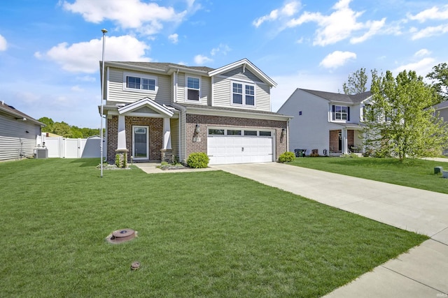 view of front of house with brick siding, fence, central air condition unit, a front yard, and driveway