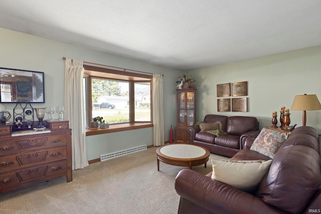 living area featuring visible vents, baseboards, and light colored carpet