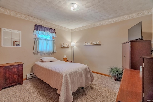 carpeted bedroom with a baseboard radiator, baseboards, and a textured ceiling