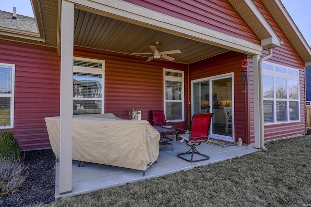 view of patio featuring ceiling fan