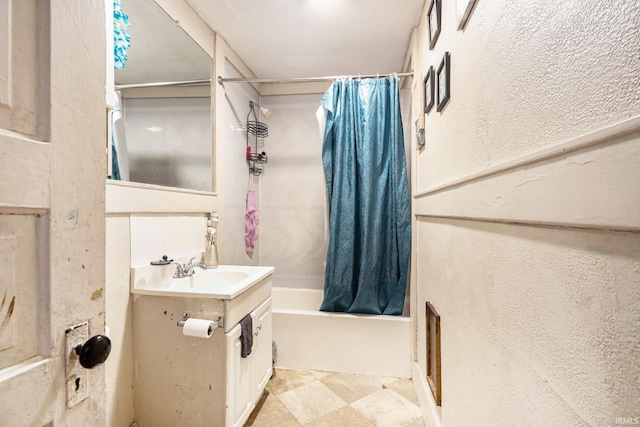 full bathroom with vanity and shower / tub combo with curtain