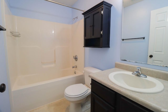 full bathroom featuring vanity, bathing tub / shower combination, toilet, and tile patterned flooring