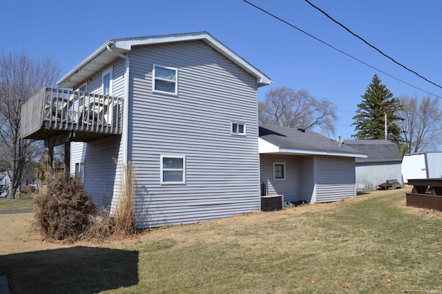 view of home's exterior featuring a yard