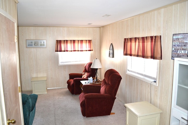 sitting room with carpet flooring