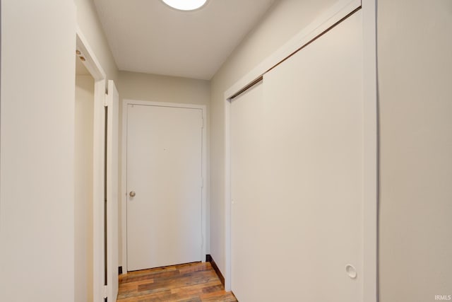 corridor with wood finished floors