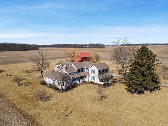 birds eye view of property featuring a rural view