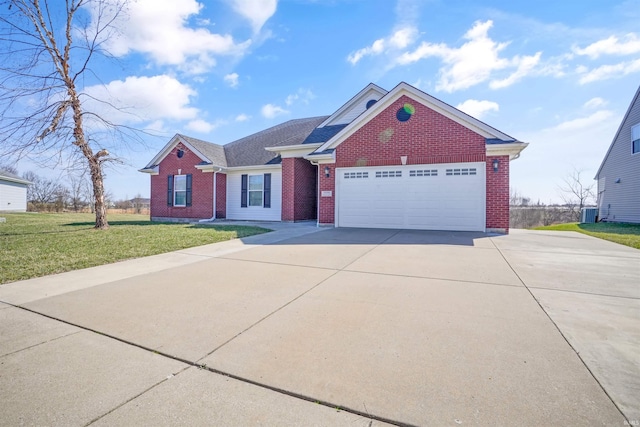 view of front of home featuring brick siding, a garage, concrete driveway, and a front yard