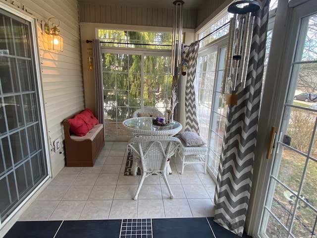 sunroom featuring a healthy amount of sunlight