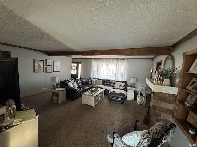 living area featuring carpet flooring, a fireplace, a textured ceiling, and ornamental molding