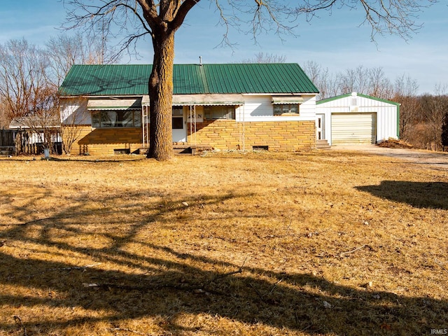 exterior space featuring a garage and driveway