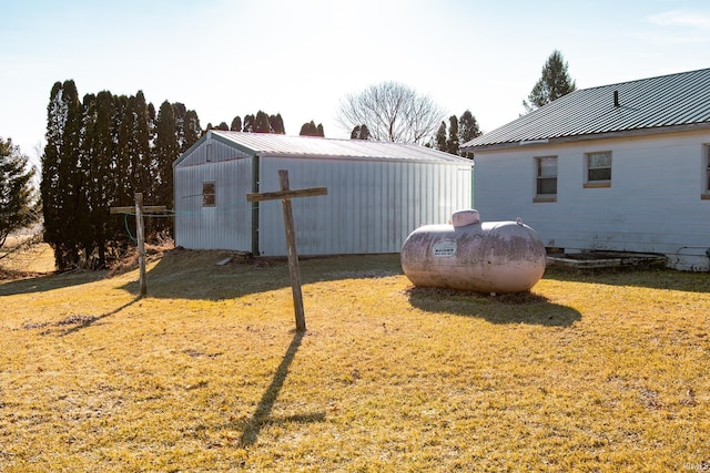 view of yard featuring an outbuilding and an outdoor structure