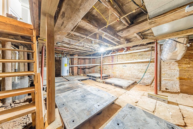 unfinished basement featuring water heater