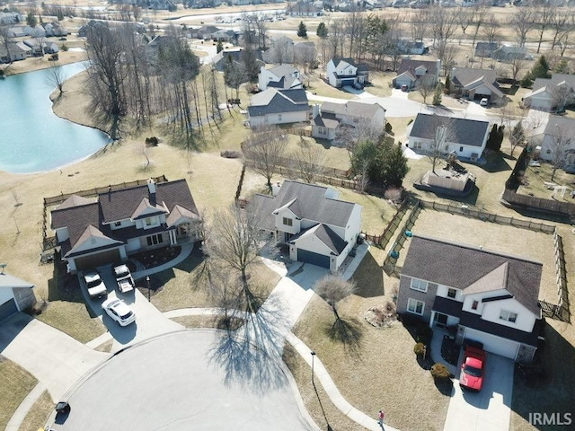 aerial view with a residential view and a water view