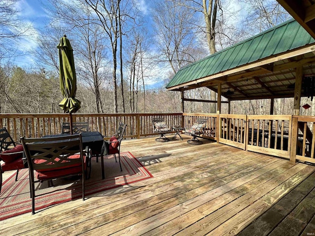 deck with outdoor dining space