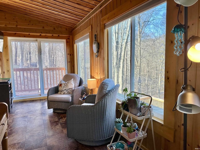 sunroom / solarium featuring vaulted ceiling and wooden ceiling