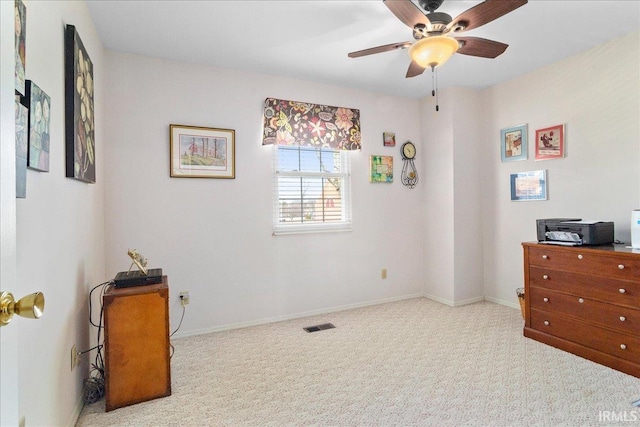 carpeted bedroom featuring visible vents and baseboards