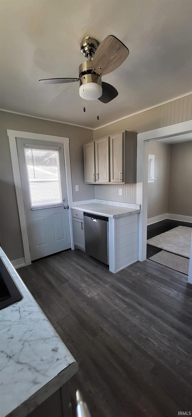 kitchen featuring ceiling fan, dishwasher, dark wood-style floors, and light countertops