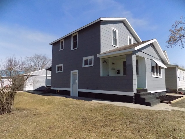 exterior space featuring entry steps and a front yard