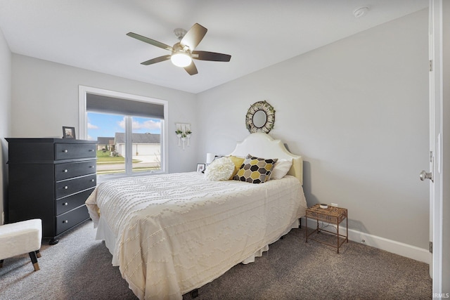 bedroom featuring ceiling fan, baseboards, and carpet floors