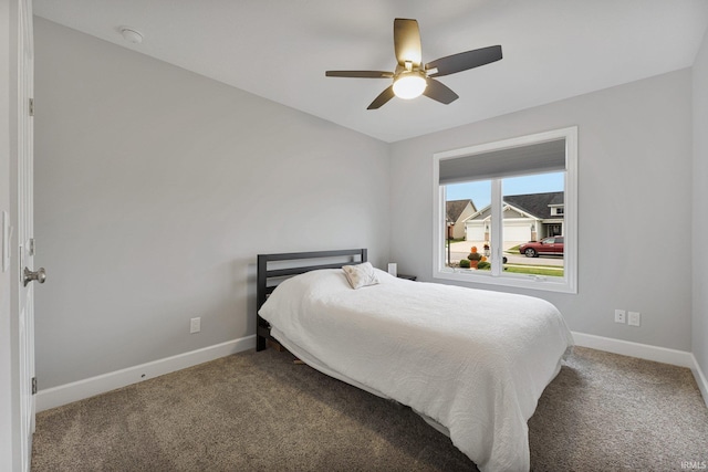 bedroom with baseboards, carpet floors, and ceiling fan