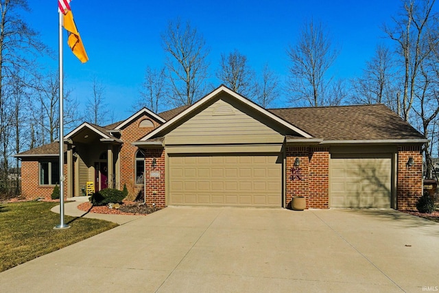 ranch-style home featuring a garage, brick siding, and concrete driveway