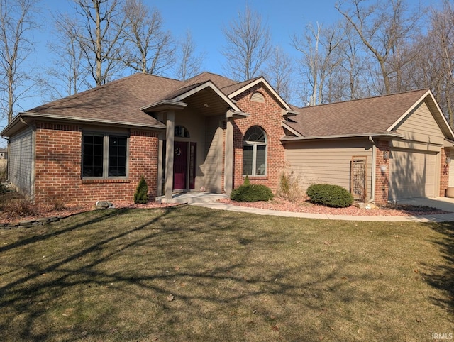 ranch-style home featuring a front yard and brick siding