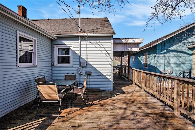 deck featuring outdoor dining area