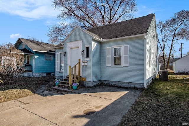 view of front of property featuring central air condition unit and entry steps