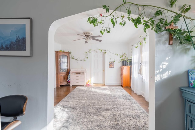 hallway with wood finished floors