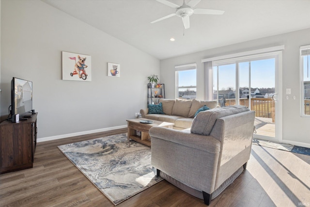 living area featuring baseboards, ceiling fan, lofted ceiling, recessed lighting, and dark wood-style flooring