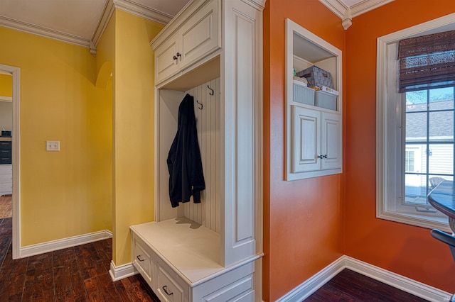 mudroom with baseboards, crown molding, and dark wood-type flooring