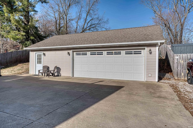 detached garage with fence